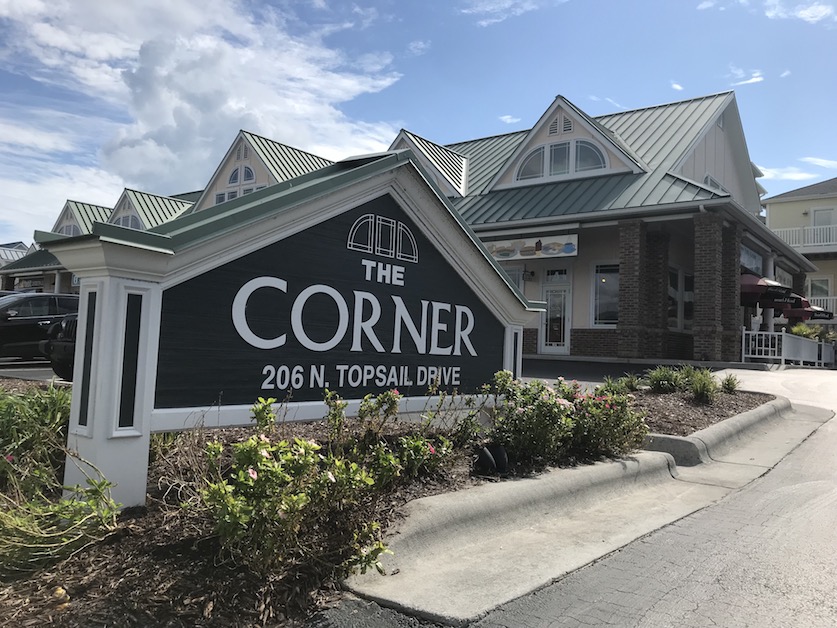 The Corner vacation rental homes sign